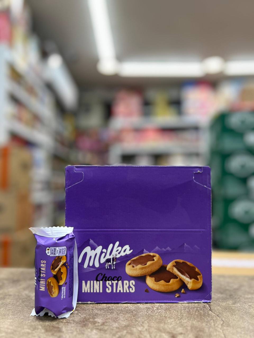 کوکی میلکا مدل Mini Stars با مغز خامه و روکش شکلات ۱۵۰ گرم باکس
