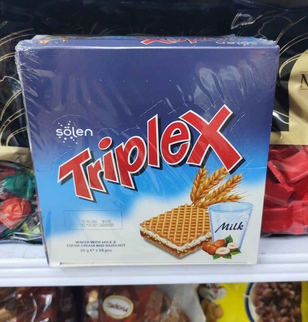 ویفر روکش دار کاکائویی با کرم شیری فندقی Triplex تریپلکس وزن 25 گرم